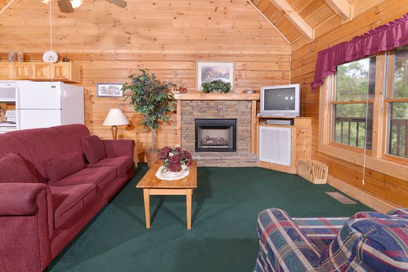 Pigeon Forge Two Bedroom Cabin with a Pull out sofa sleeper and a gas fireplace convenient to down town Pigeon Forge