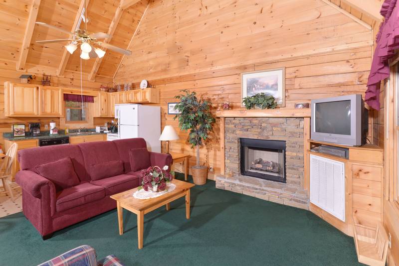 Pigeon Forge Cabin near Gatlinburg and Pigeon Forge featuring Two Bedrooms Pool Table and a Hot Tub