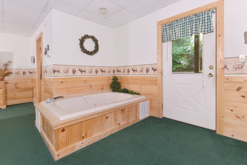 Lower Level year round indoor whirl pool in the Master Bedroom Suite