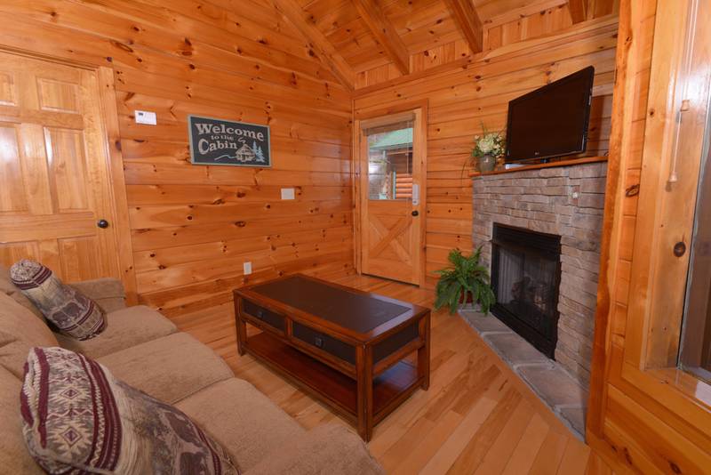  Livingroom Area in this Pigeon Forge Honeymoon Cabin Rental