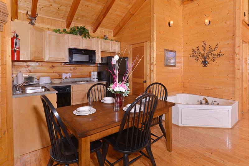 Pigeon Forge Cabin Rental that features a Whirl Pool in the Master Suite