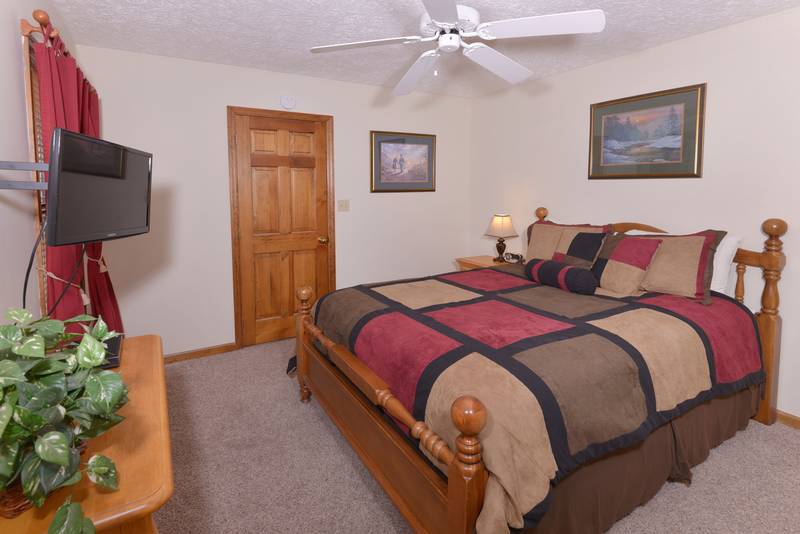 Main Level Bedroom Featuring a Queen Size Bed