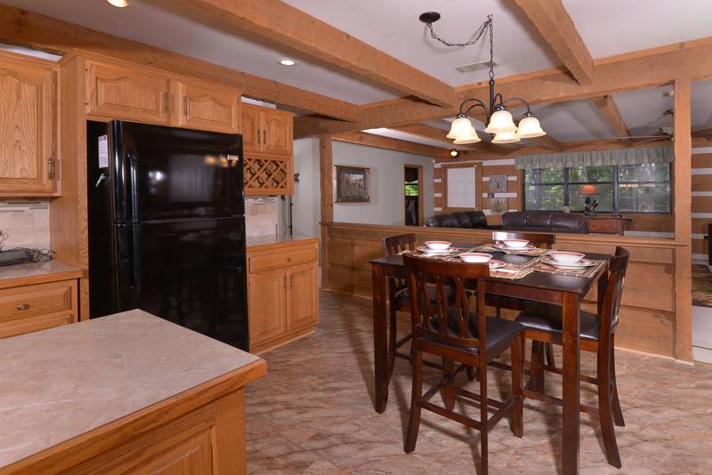 Pigeon Forge Cabin Rental Kitchen Area Overlooking the Livingroom Area