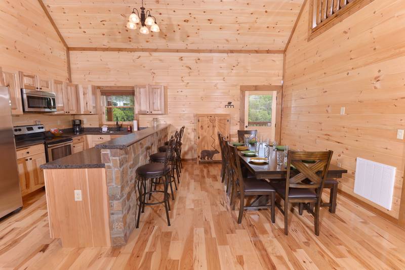 This Pigeon Forge Cabin offers plenty of seating for the entire family.
