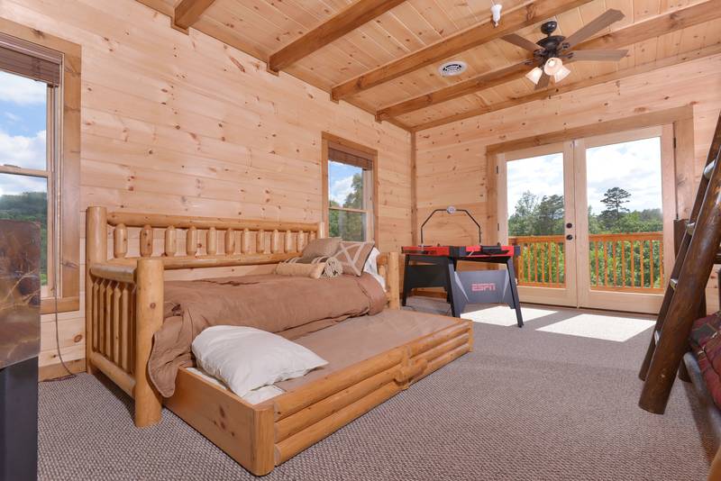 This Cabin Features a Trundle Bed in the loft area for extra sleeping