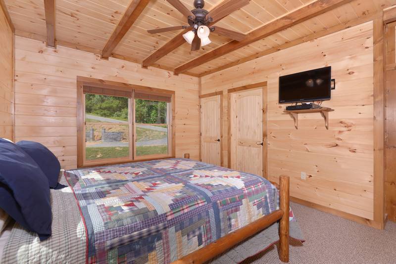 This Pigeon Forge Cabin Rental offers an Upper Level Bedroom Area