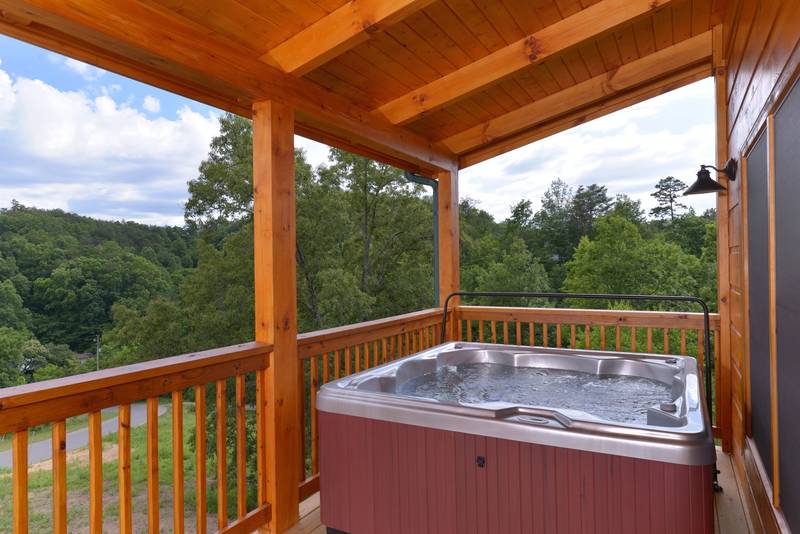 This Pigeon Forge Luxury Three Bedroom Family Retreat Cabin Rental