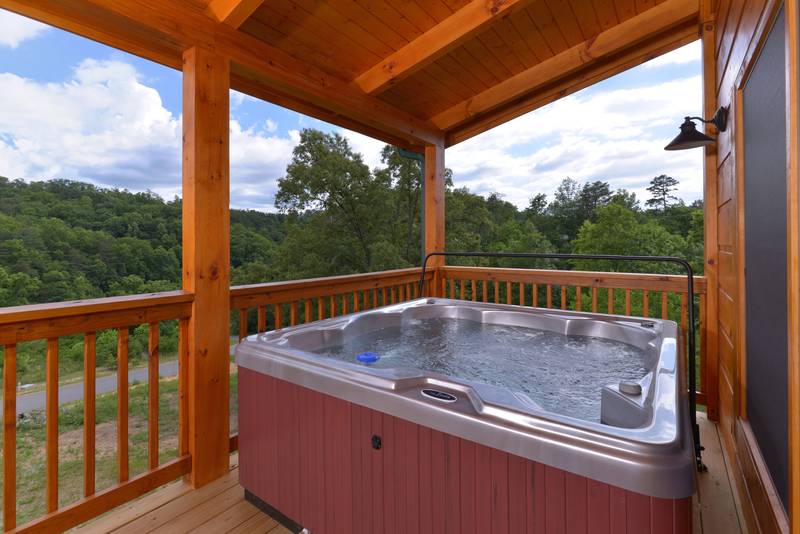 This Tennessee Vacation Cabin Rental Hot Tub has plenty of seating