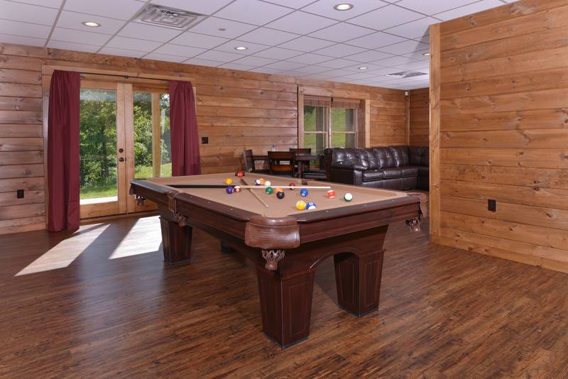 This Pigeon Forge Pool Table is located in a Three Bedroom Cabin Rental