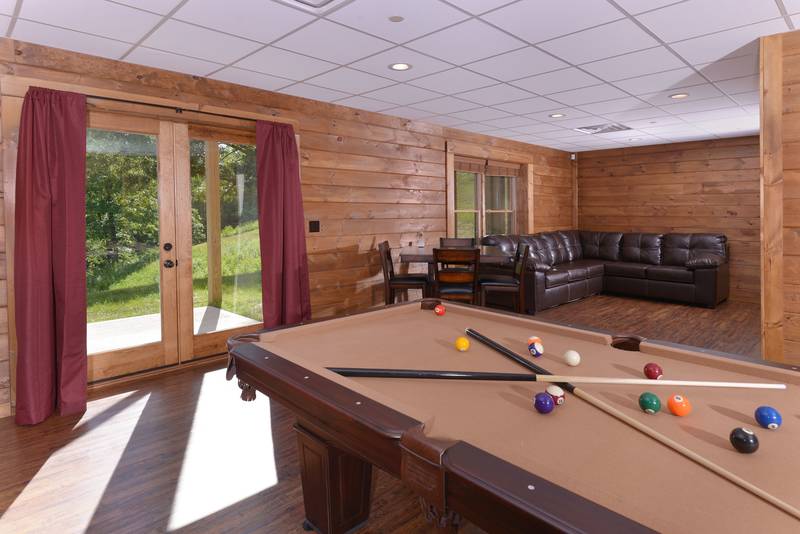Family Retreat Pigeon Forge Cabin Rental with a Large Gameroom Featuring a Pool Table