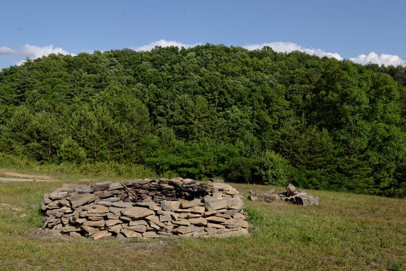 Pigeon Forge Outdoor Area that features a wood burning outdoor firepit