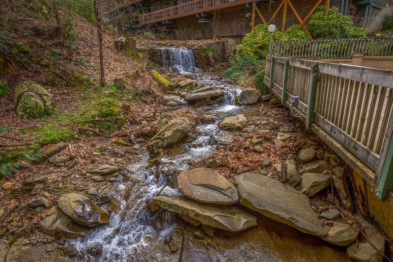 Rustic River waterfall at Village Stream Condos