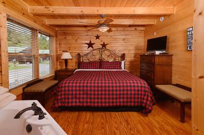 River Cabin bedroom with king size bed