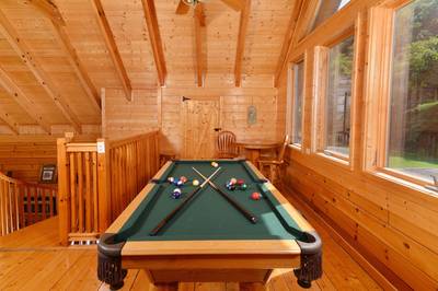 River Cabin upper level open loft with pool table