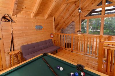 River Cabin upper level open loft with pool table and futon