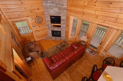 River Cabin view of living room from open loft