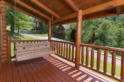 A Smoky Getaway covered back deck with swing