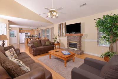 Striking Waters living room with 50-inch flat screen TV