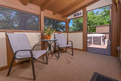 Striking Waters main level screened in back deck