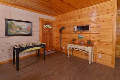 Serenity Ridge living room with foosball table
