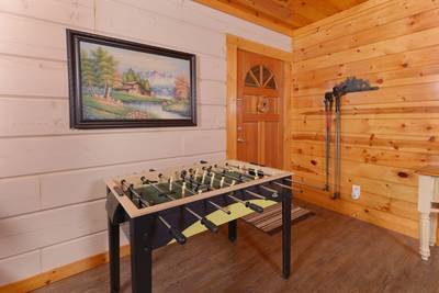 Serenity Ridge living room with foosball table