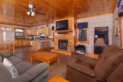 Serenity Ridge living room with fully furnished kitchen