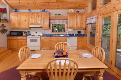Allen's Hideaway dining area with seating for four