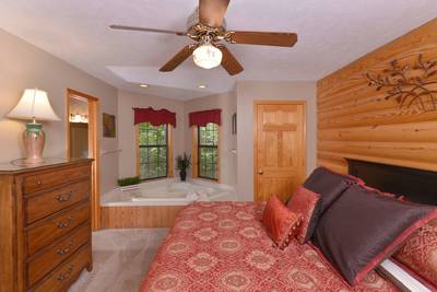 Allen's Hideaway master bedroom with king size bed and in-room jacuzzi