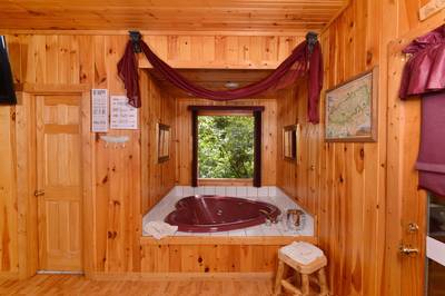 Deer to Dream upper level loft bedroom heart shaped jacuzzi