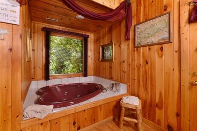 Deer to Dream upper level loft bedroom heart shaped jacuzzi