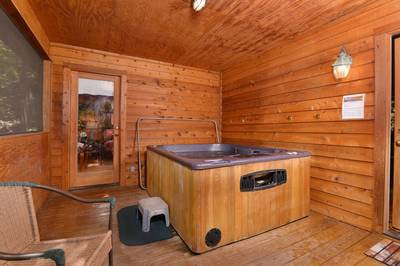 Deer to Dream main level screened in back deck with hot tub