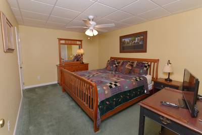 Whispering River lower level bedroom 3 with king size bed