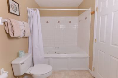 Whispering River lower level bathroom 3 with tub/shower combo