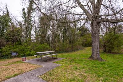 Whispering River picnic area in front yard