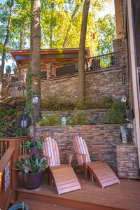 Crystal Waters lower level deck with Adirondack chairs