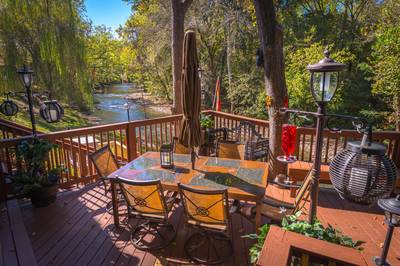 Crystal Water lower level deck with table and chairs