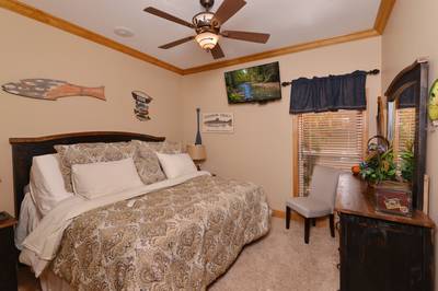 Crystal Waters lower level bedroom two with adjustable queen size bed