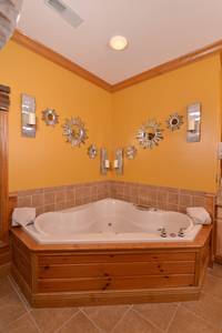 Crystal Waters main level bathroom one with Whirlpool tub