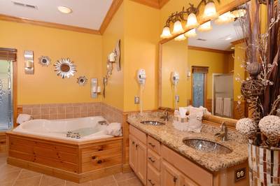 Crystal Waters main level bathroom one with Whirlpool Tub