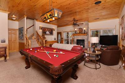 Crystal Waters lower level game room with pool table