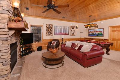 Crystal Waters lower level game room with sleeper sofa