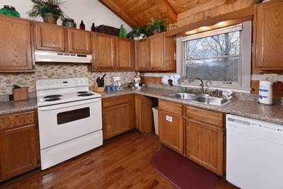 Pleasant View fully furnished kitchen with dishwasher