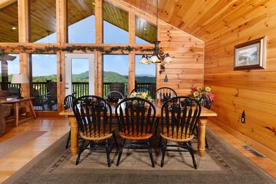 Getaway Mountain Lodge dining area with floor to ceiling windows