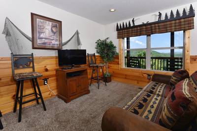 Getaway Mountain Lodge lower level game room with 40-inch flat screen TV