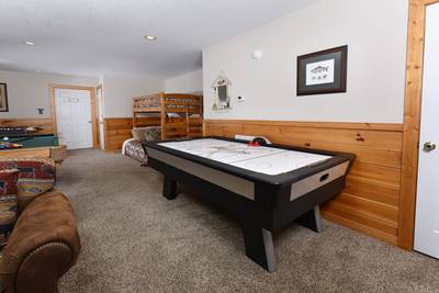 Getaway Mountain Lodge lower level game room with air hockey table