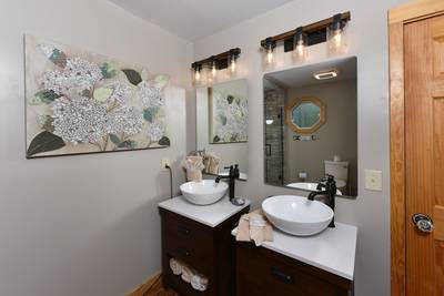 Cabin Fever bathroom with double vanity