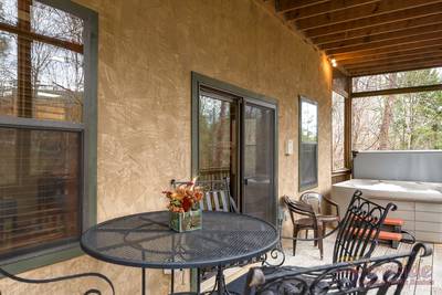 Best Time Ever covered back deck with table and chairs