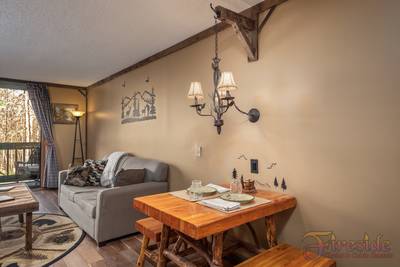 Rustic River dining area and sleeper sofa