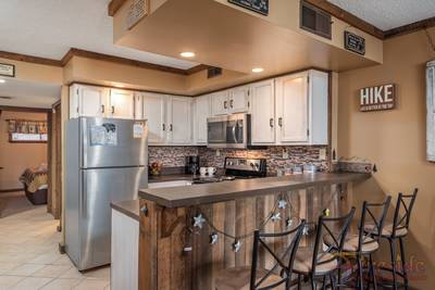 Rustic River bar and fully furnished kitchen