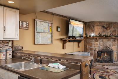 Rustic River bar and living room area
